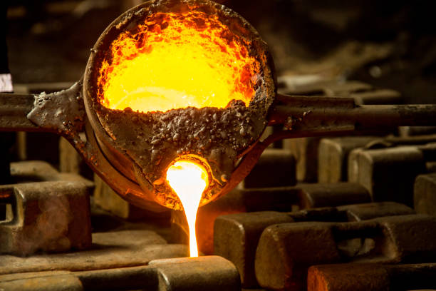 istock metal casting process with red high temperature fire in metal part factory 1138333936