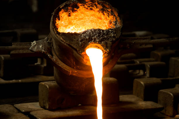 istock metal casting process with red high temperature fire in metal part factory 1138333962