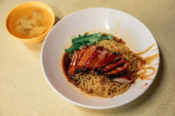 Photo of Dried Won Ton noodles with roasted BBQ pork, Wan tan mee , Chinese cuisine