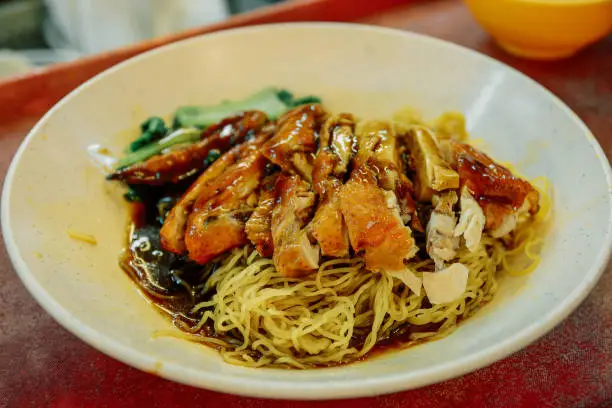 Photo of Dried Won Ton noodles with roasted BBQ chicken, Wan tan mee , Chinese cuisine