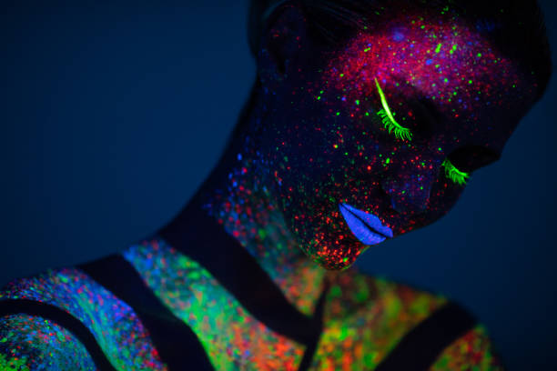 istock One woman painted with fluorescent make up 1138347998
