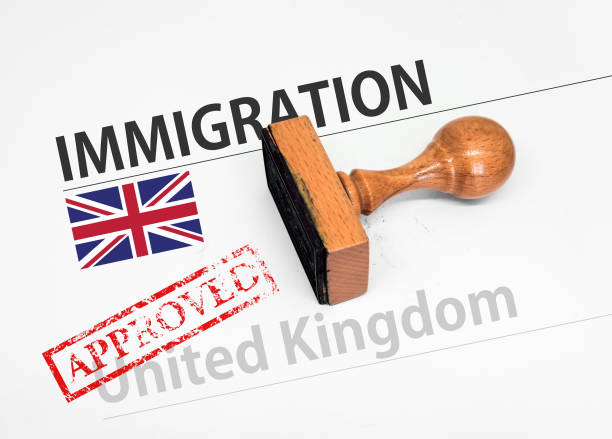 Approved Immigration United Kingdom application form Approved Immigration United Kingdom application form with rubber stamp embassy photos stock pictures, royalty-free photos & images