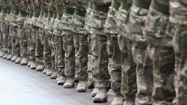 Army Soldiers in line marching at a Military homecoming parade