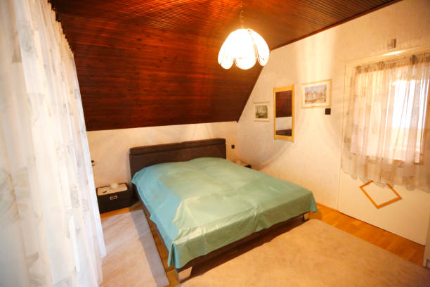 istock Bedroom in hotel room 1138352012
