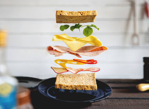 strati sandwich decostrutti in cucina - cheese sandwich foto e immagini stock