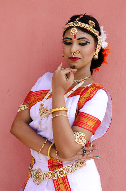 istock Indian classical dancer in traditional dress 1138355522