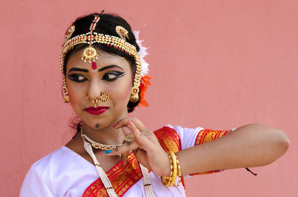 istock Indian classical dancer in traditional dress 1138355588