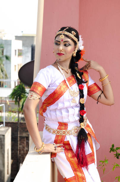 istock Indian classical dancer in traditional dress 1138355677