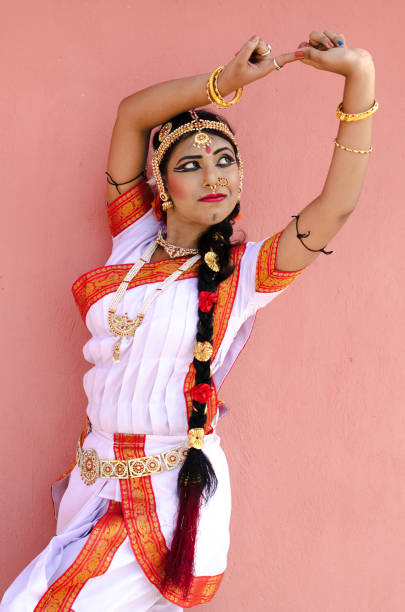 istock Indian classical dancer in traditional dress 1138355702