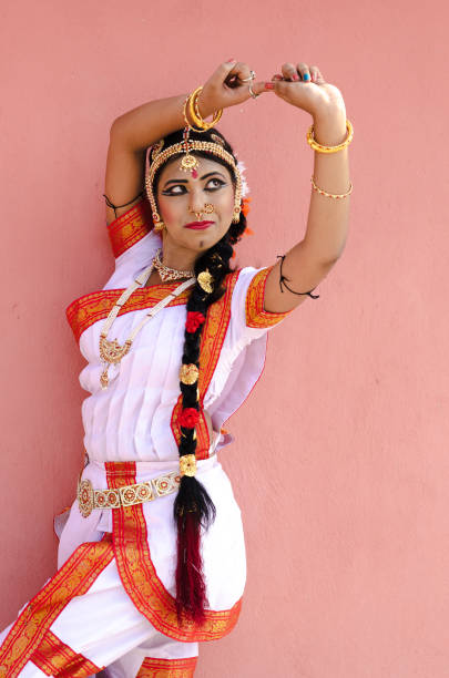 istock Indian classical dancer in traditional dress 1138355706