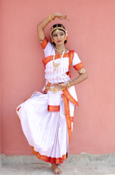 istock Indian classical dancer in traditional dress 1138355712