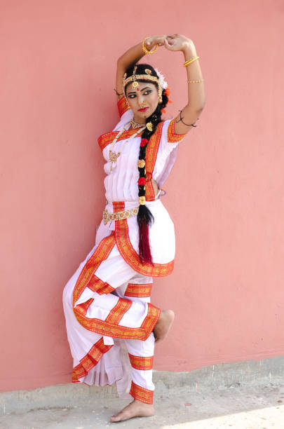 istock Indian classical dancer in traditional dress 1138355713