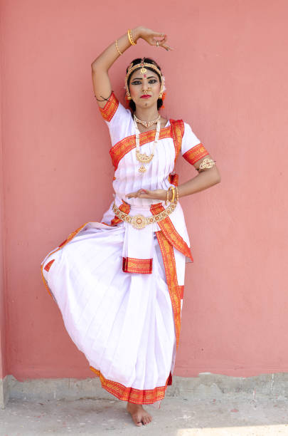 istock Indian classical dancer in traditional dress 1138355729