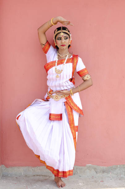 istock Indian classical dancer in traditional dress 1138355730
