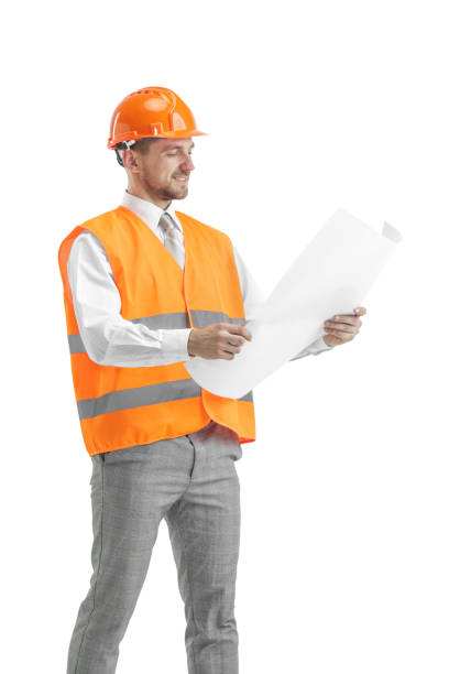 istock The builder in orange helmet isolated on white 1138355762