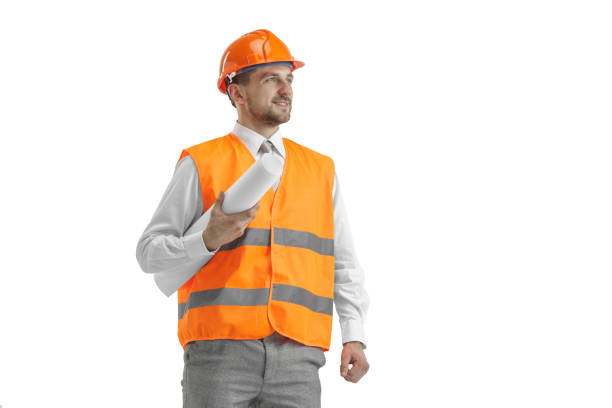 istock The builder in orange helmet isolated on white 1138355775