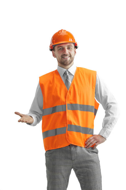 istock The builder in orange helmet isolated on white 1138355799