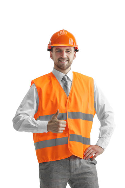 istock The builder in orange helmet isolated on white 1138355802