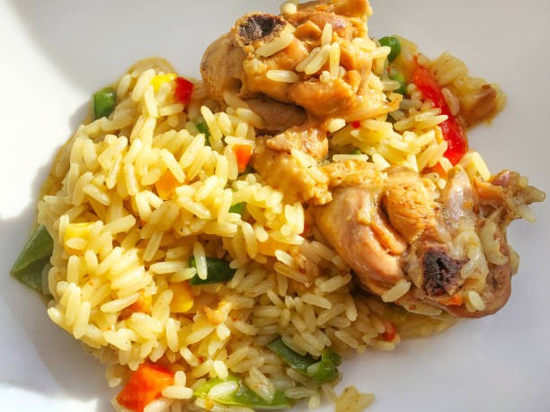 istock Boiled rice or pilaf with chicken on plate 1138356488