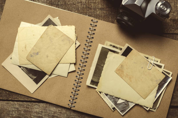 istock old photos on the wooden table 1138356613
