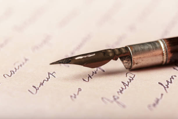 istock Fountain pen on an antique handwritten letter 1138356897