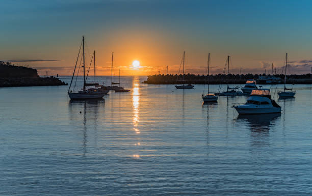 istock Sunrise and boats in the harbour 1138357915