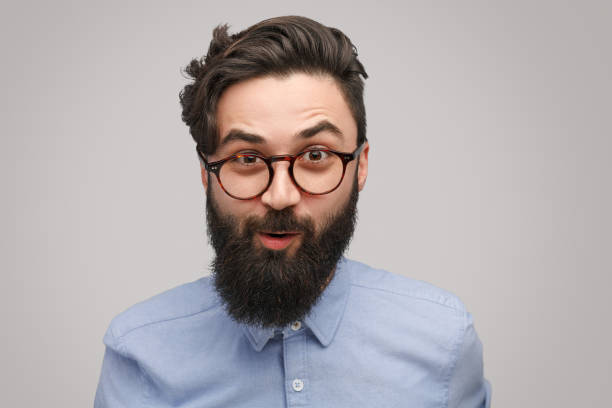 istock Amazed bearded male looking at camera 1138358738