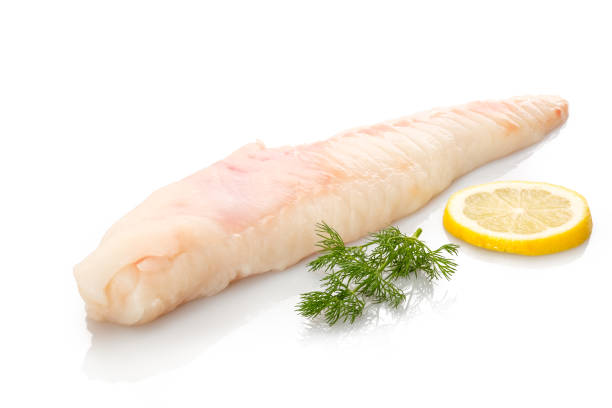 monkfish filet raw with dill and lemon - anglerfish imagens e fotografias de stock