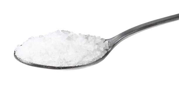 istock steel teaspoon with coarse grained Sea Salt 1138361913