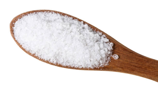 istock top view wood salt spoon with Rock Salt close up 1138361922