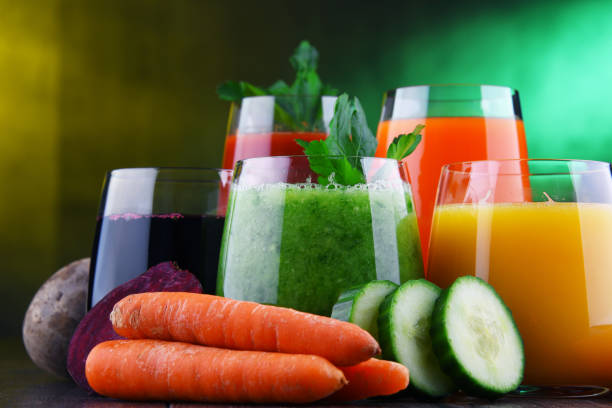 istock Glasses with fresh organic vegetable and fruit juices 1138363594