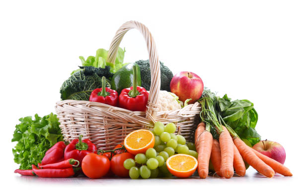 istock Fresh organic fruits and vegetables in wicker basket 1138363632