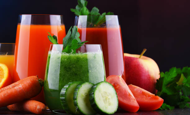 istock Glasses with fresh organic vegetable and fruit juices 1138363706