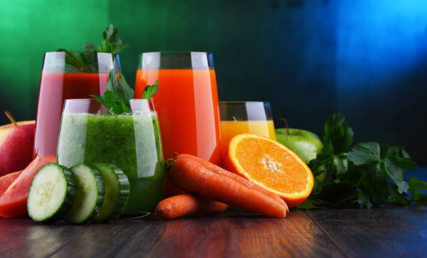 istock Glasses with fresh organic vegetable and fruit juices 1138363889