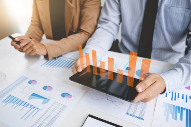 istock Investment and cooperate concept, business financial inspector analyzing about parformance data in office meeting. 1138364142