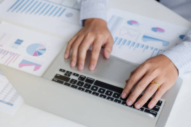 istock Businessman analyst using on laptop in a modern office. 1138364236