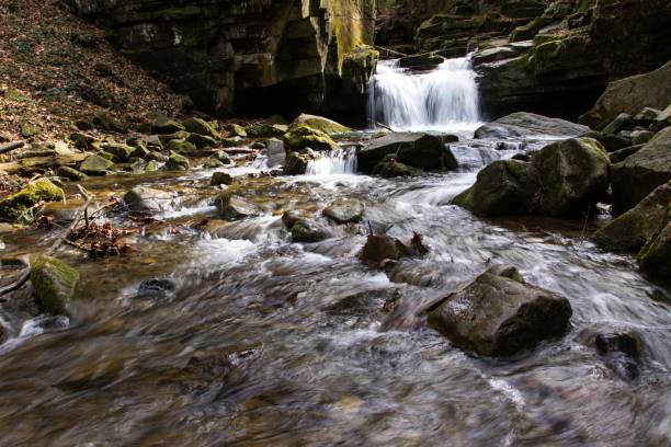 istock mountain waterfall among big stones 1138364354