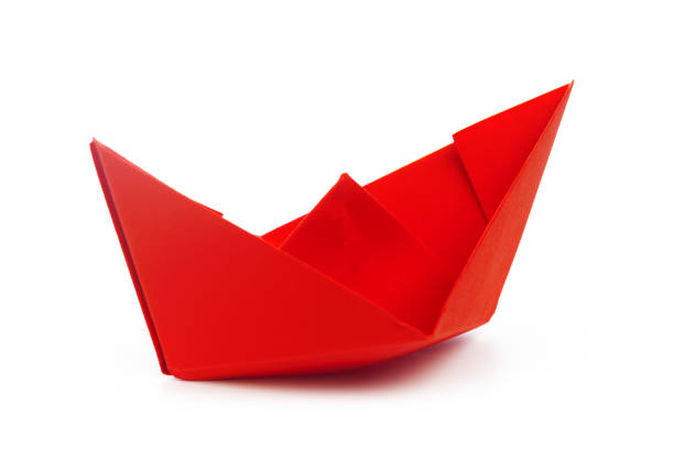 istock origami paper boat isolated on white background 1138365370