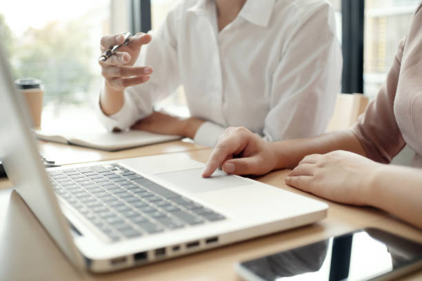 istock Investment and cooperate concept, business financial inspector analyzing about parformance data in office meeting. 1138365460