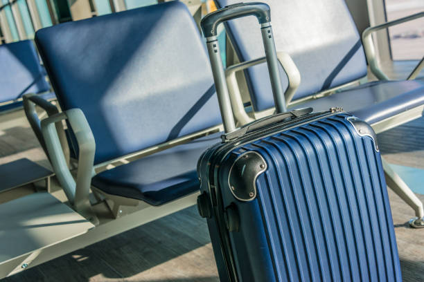 istock Plastic travel suitcase in the airport hall 1138365838