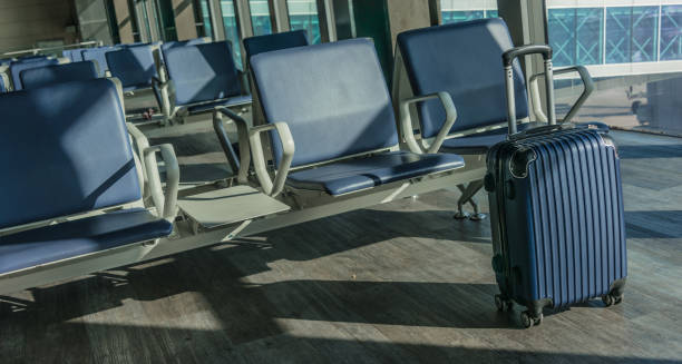 istock Plastic travel suitcase in the airport hall 1138365905