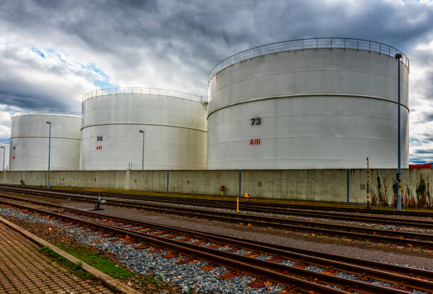 three oil or gas silos in the port