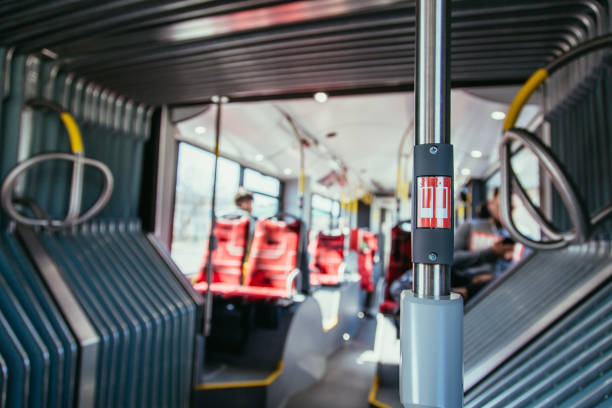 Interior of a public transport bus, stop button