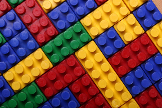 istock High quality seamless background of colored plastic bricks 1138369193