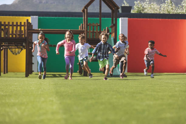 Students running in school playground