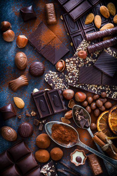 istock Chocolate assortment and cocoa powder shot from above 1138370037