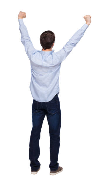 istock Back view of a man celebrating victory. 1138375728