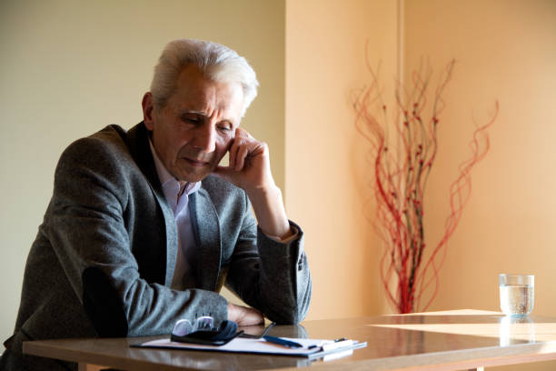istock Mature businessman feeling sad 1138382122