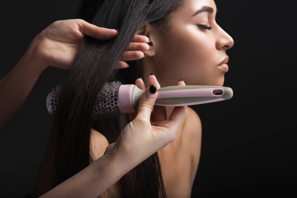 istock African girl making new hairstyle 1138382134