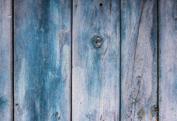 istock Faded vignette blue color on wooden board 1138382761